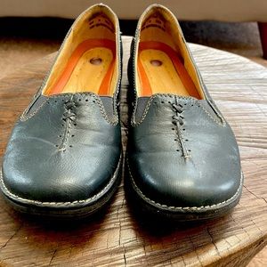 Clarks slip on shoes.